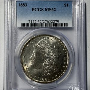 Alternative view of JAV - 1883 metų 1 doleris - "Morganas" - PCGS MS62 - (Sidabras 900 / 26,73 g) – (Sesija Nr.92 – Pabaiga 20260514 – 21.08 val. + 2 min. „Anti-sniping”)